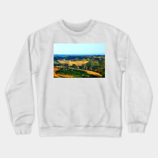 Rural view in Acquaviva Picena with rugged Marche landscape, meadows, ravines and scattered houses Crewneck Sweatshirt